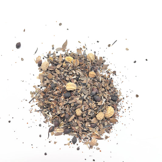 Hummingbird mix of flower seed on a white surface 